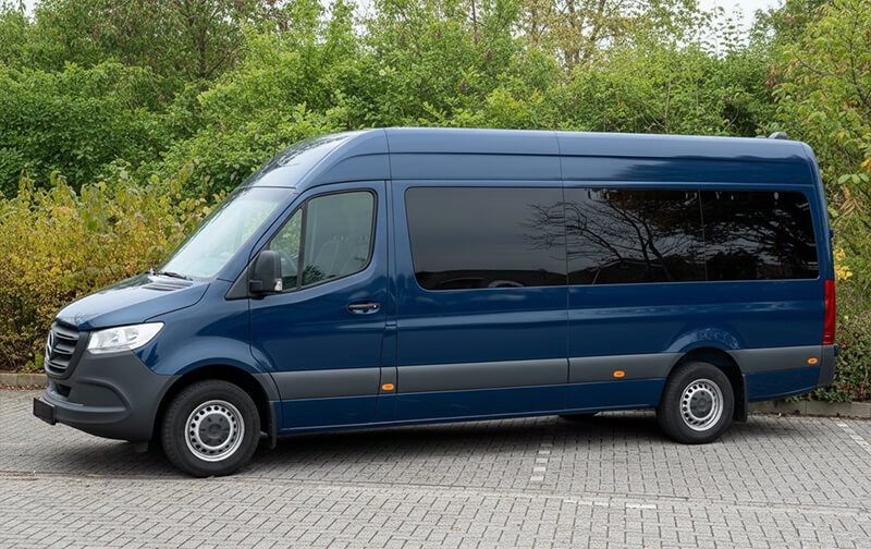 Blue Mercedes-Benz Sprinter 17-seat minibus, side view