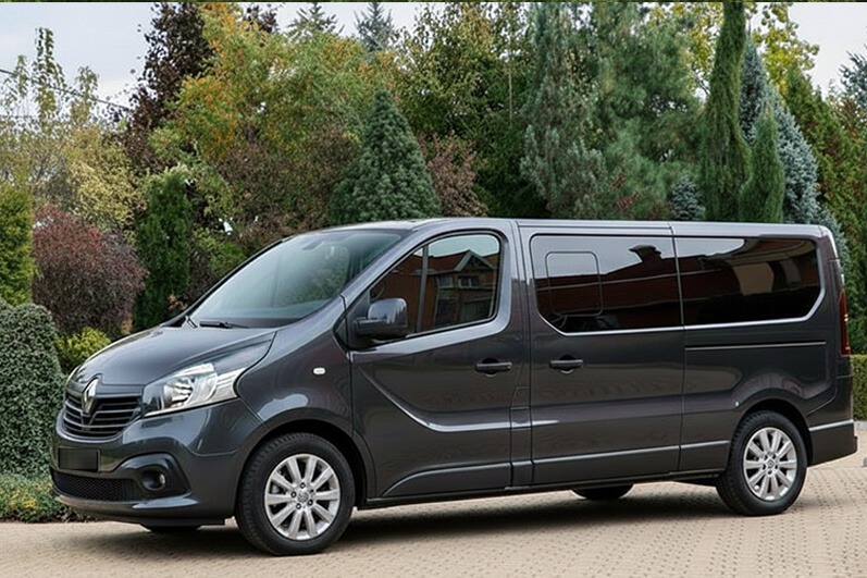 Grey Renault Trafic passenger van, front three-quarter view